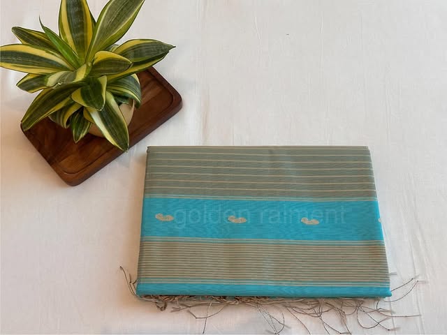Maheshwari silk-cotton saree in teal and grey with woven motifs